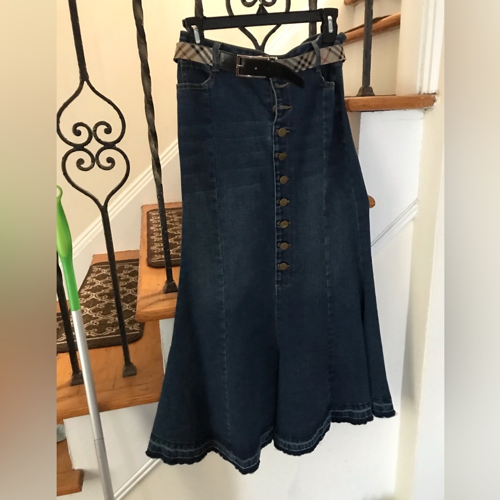 Denim jean skirt. Worn once. Burberry Belt is not included. Listed separately.